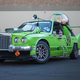 Illustration for article titled Someone Finally Built Homer Simpsons Hideous Green Car
